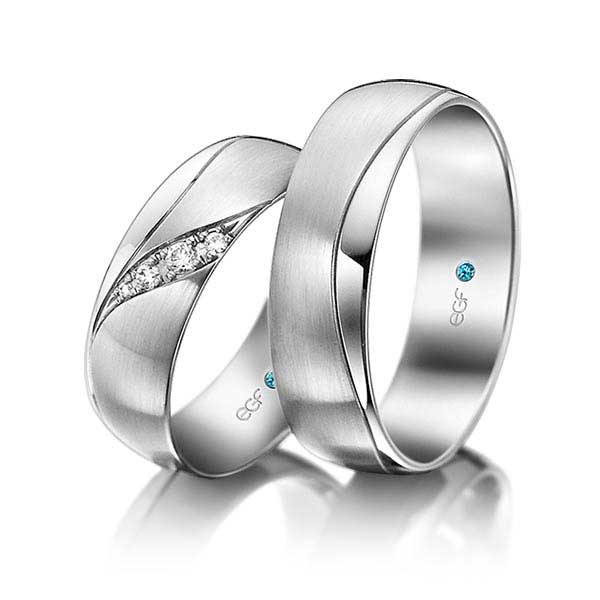 Elegante-witgouden-trouwringen-met-4-diamanten-van-in-totaal-0.06ct-Circles Trouwringen-Zwijndrecht