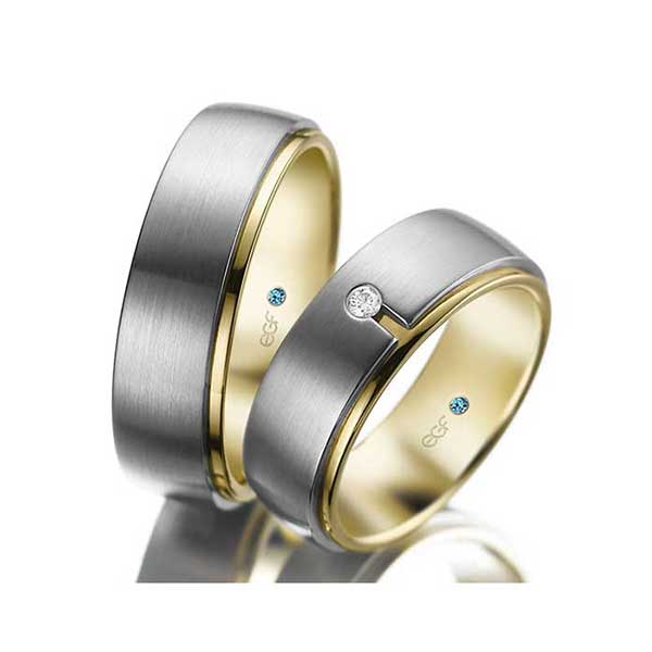 Trouwringen-met-geelgouden-zetting-Circles-Trouwringen