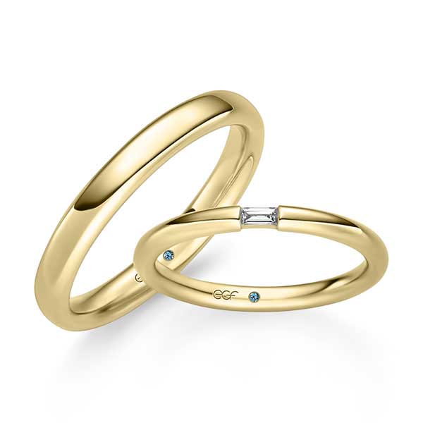 Geelgouden trouwringen met baguette-geslepen-diamant
