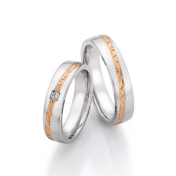 Trouwringen staal - roodgoud